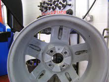 The same alloy wheel, now straightened